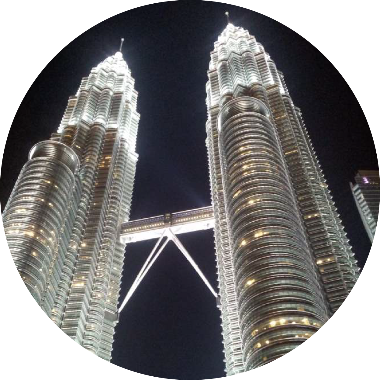 An inmage of the Petronas Twin Towers from the Kuala Lumpur city tour package conducted by the dedicated Malaysian tour guides here at MM Adventure, representing the vibrant, historical cities you can explore when travelling in and around Kuala Lumpur, Malaysia.